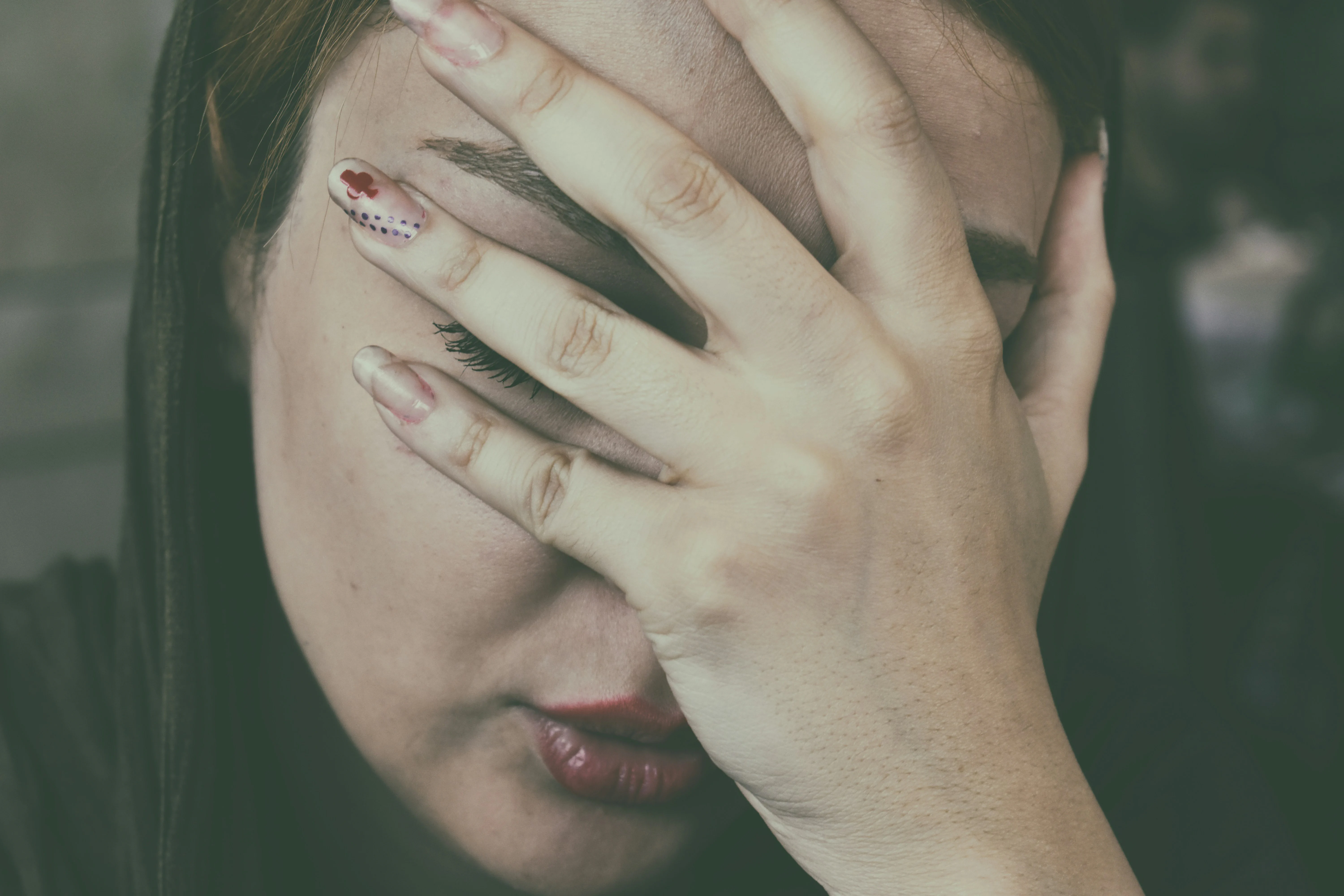 Person experiencing digital eye strain from computer screen